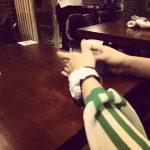 female hands dealing cards