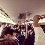 metro hands crowded train