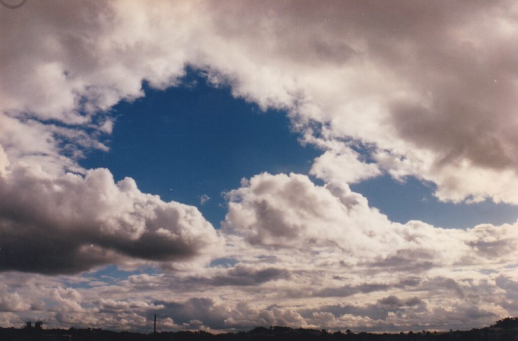 View Of Sunshine And Clouds In Overcast Sky From Centennial Lookout