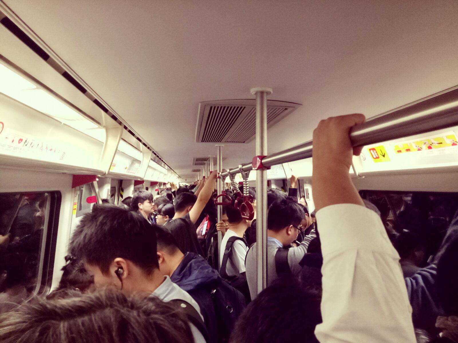 metro hands crowded train