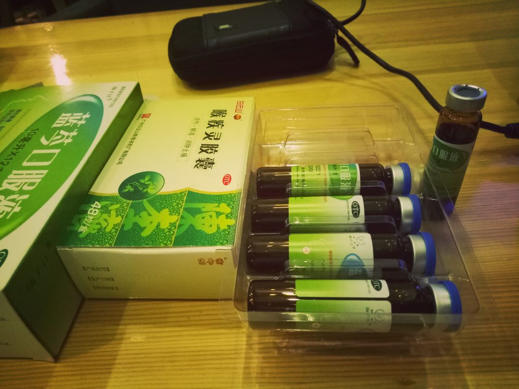 chinese medication green glass capsules