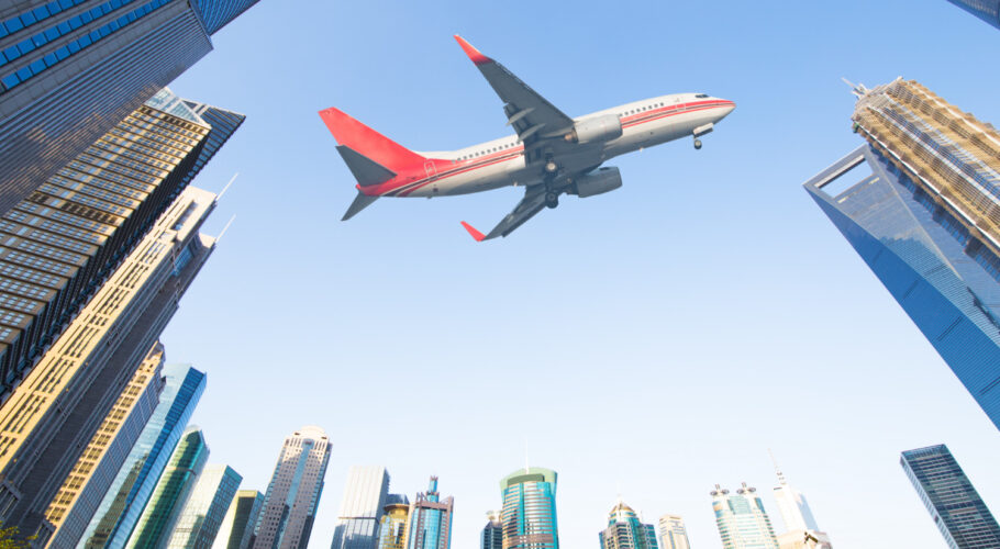 aircraft with shanghai skyline lujiazui financial center china