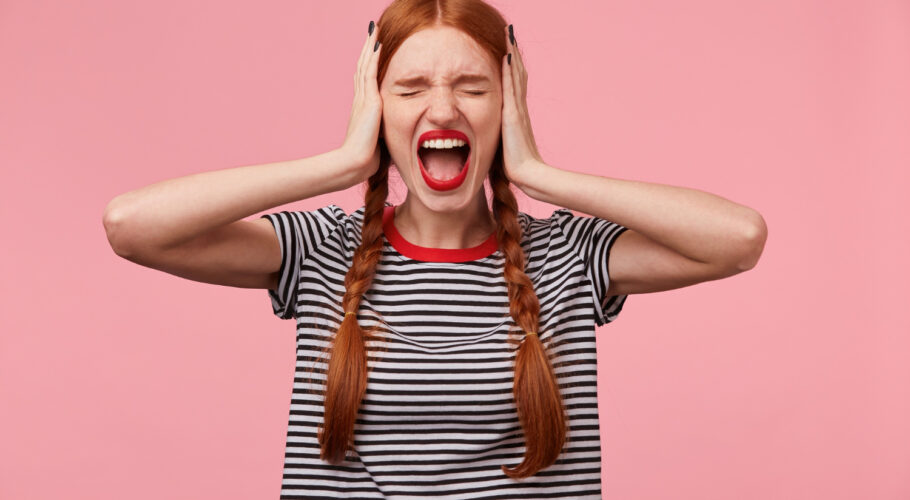 angry young red haired girl gesture ignore demonstrates loud scream shout kathryn