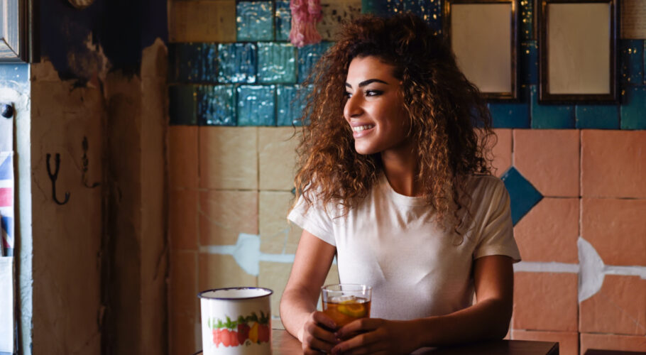arabic woman beautiful bar looking through window