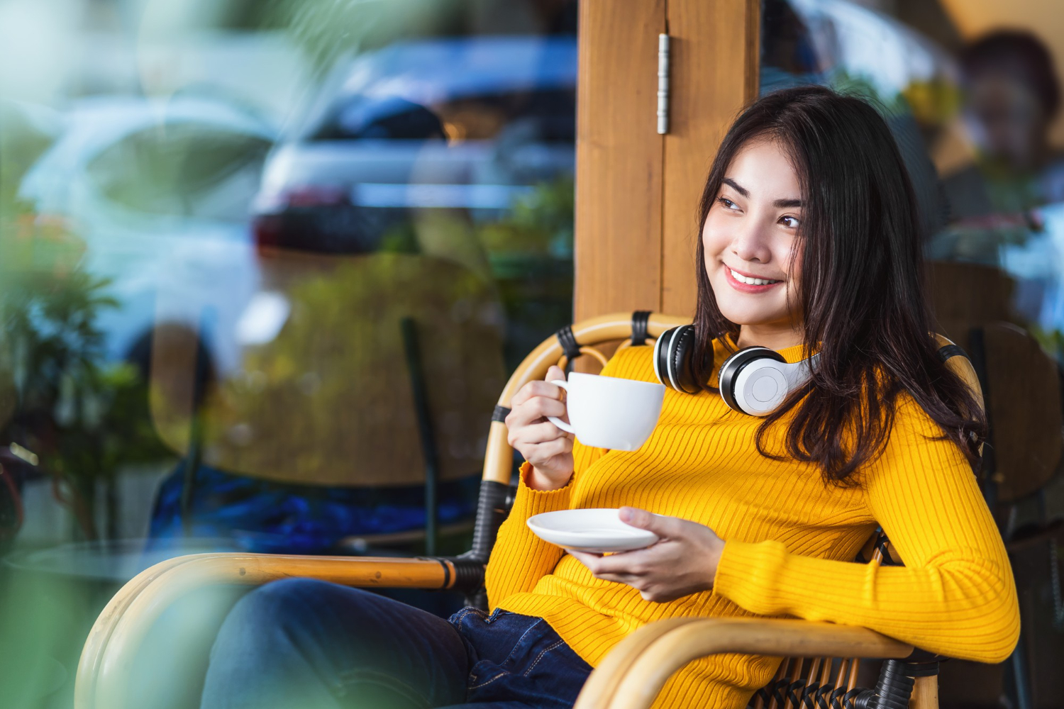 asian young female holding cup coffee sitting modern coffee shop coworking space china starbucks