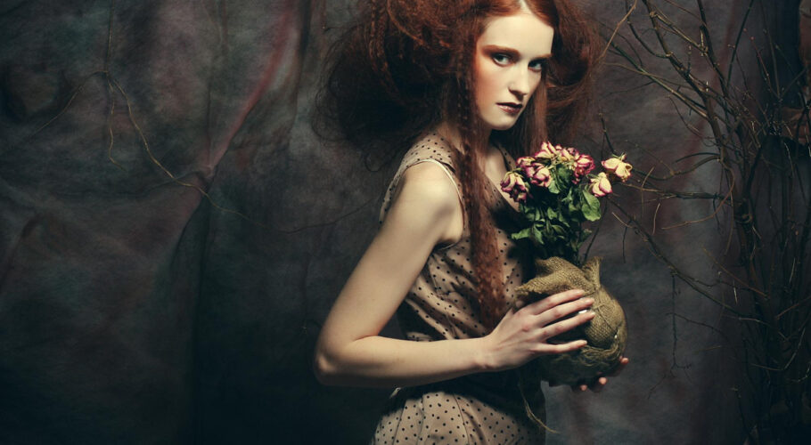 beautiful girl with dry roses decoration artwork