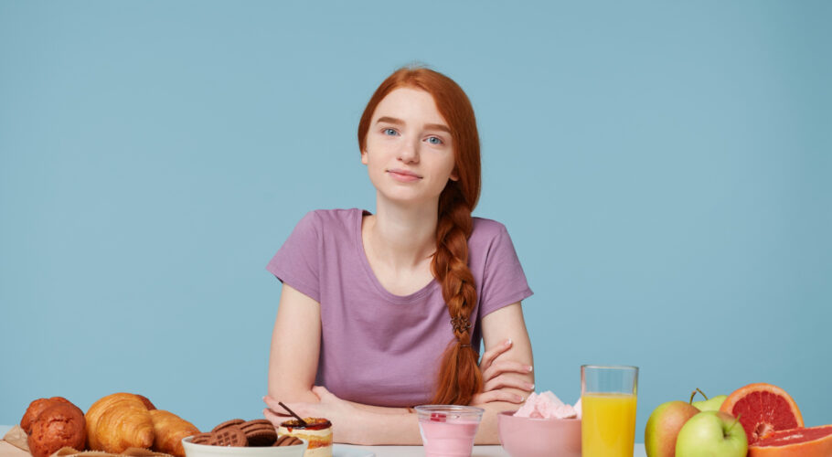 beautiful red haired girl with braided hair sitting table about eat breakfast kathryn
