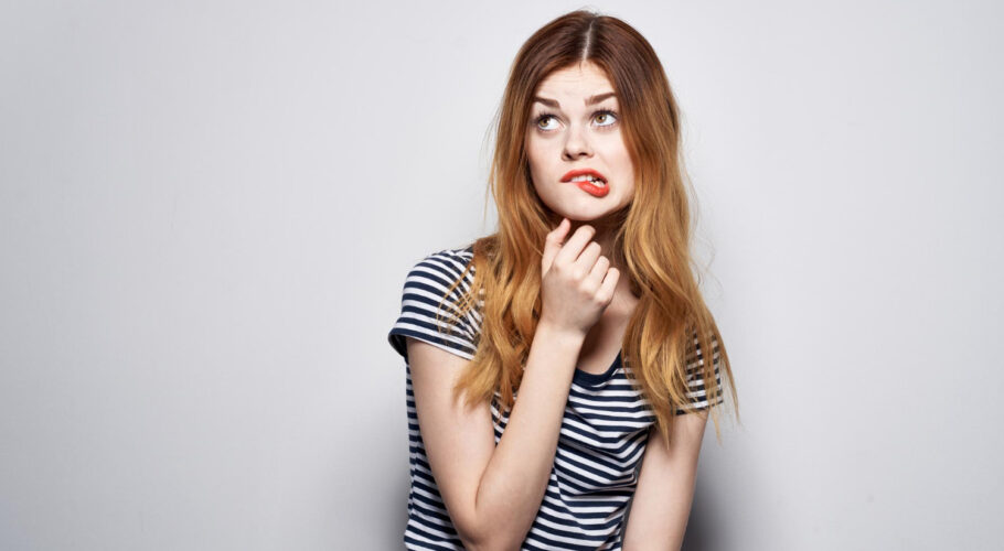 beautiful woman holding hair makeup posing fun fashion expression
