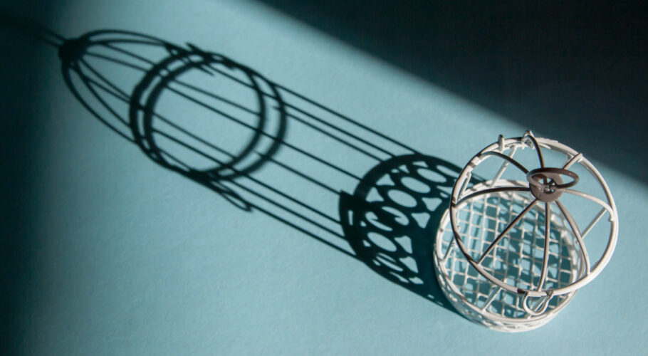 birdcage with hard shadows symbol imprisonment bondage
