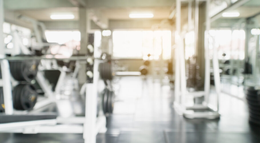 gym with equipment blurry fitness room