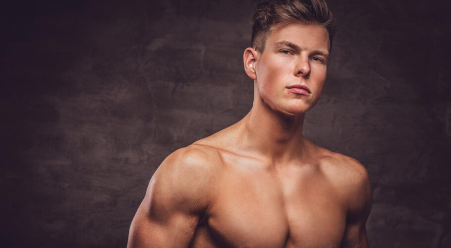 close up portrait sexy shirtless young man model with muscular body stylish haircut