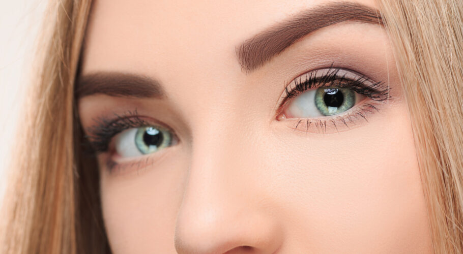 close up face pretty girl with beautiful big blue eyes