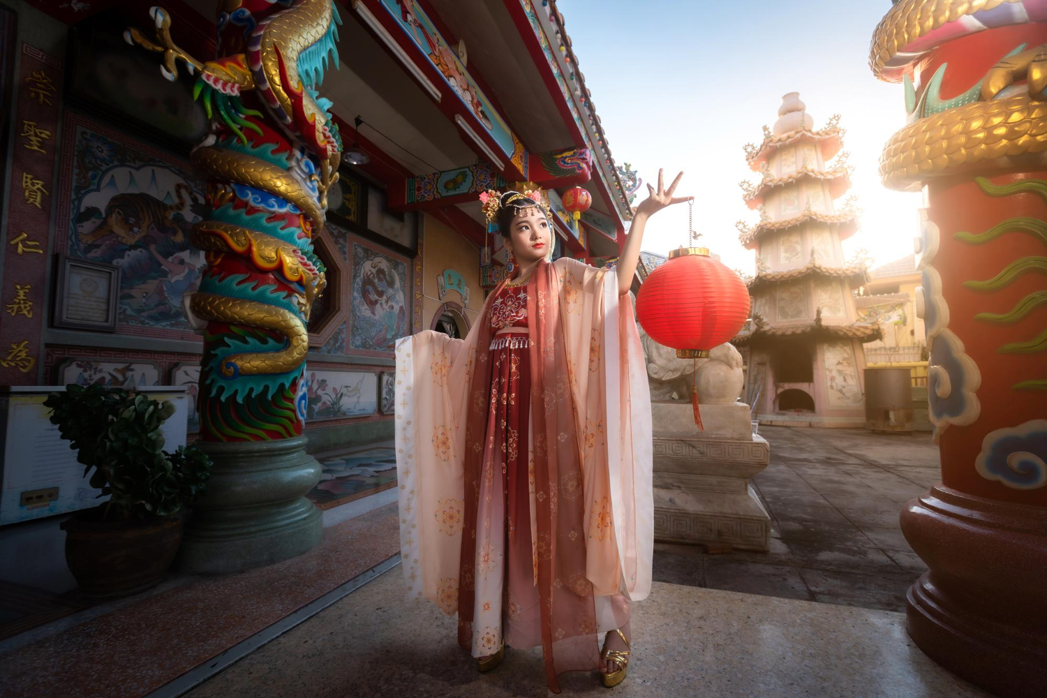 cute little asian girl wearing chinese costumes decoration hold paper lanterns
