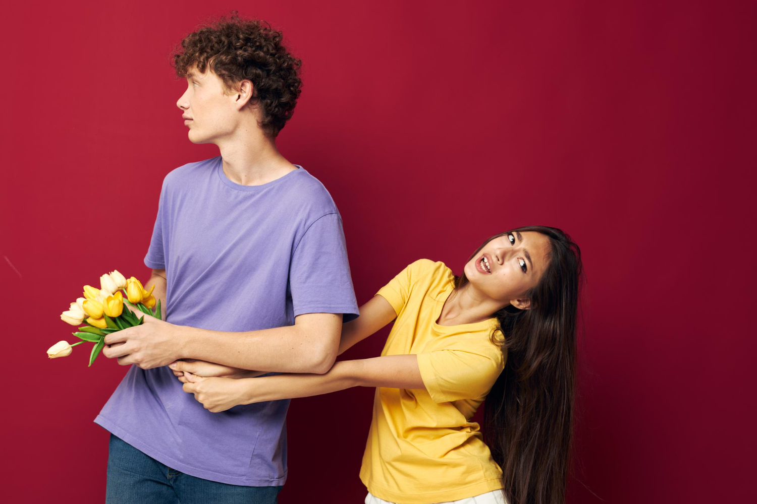 cute young couple bouquet of yellow flowers based on friendship