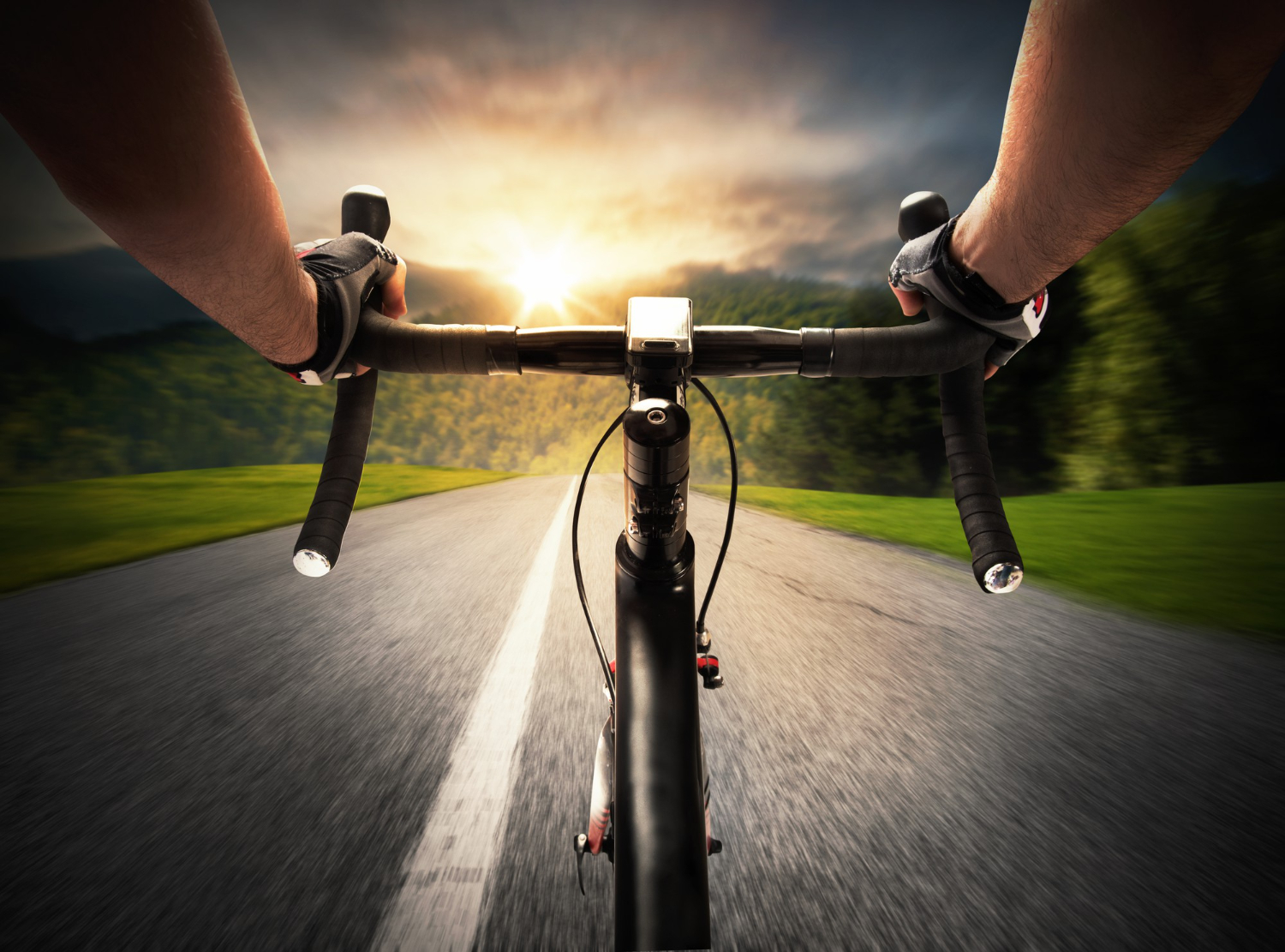 cyclist pedaling on the street in daylight