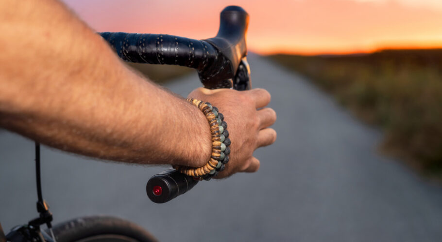cyclist riding bycicle sunset pov view