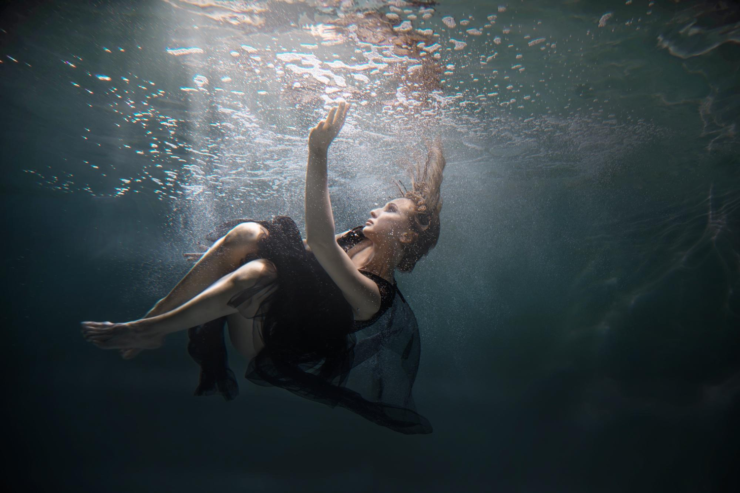 dancer underwater state peaceful levitation