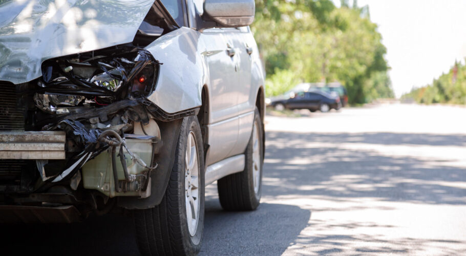 destroyed car car crash traffic accident city road with-copy-space-city-road-smashed