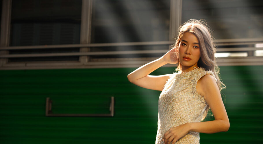 Fashionable Asian Women At Train Station Travelling