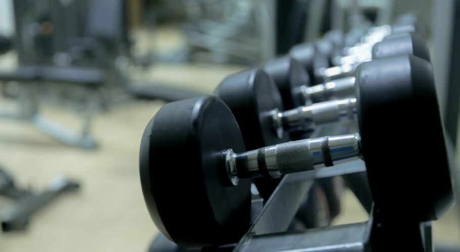 fitness equipment in bodybuilding gym room