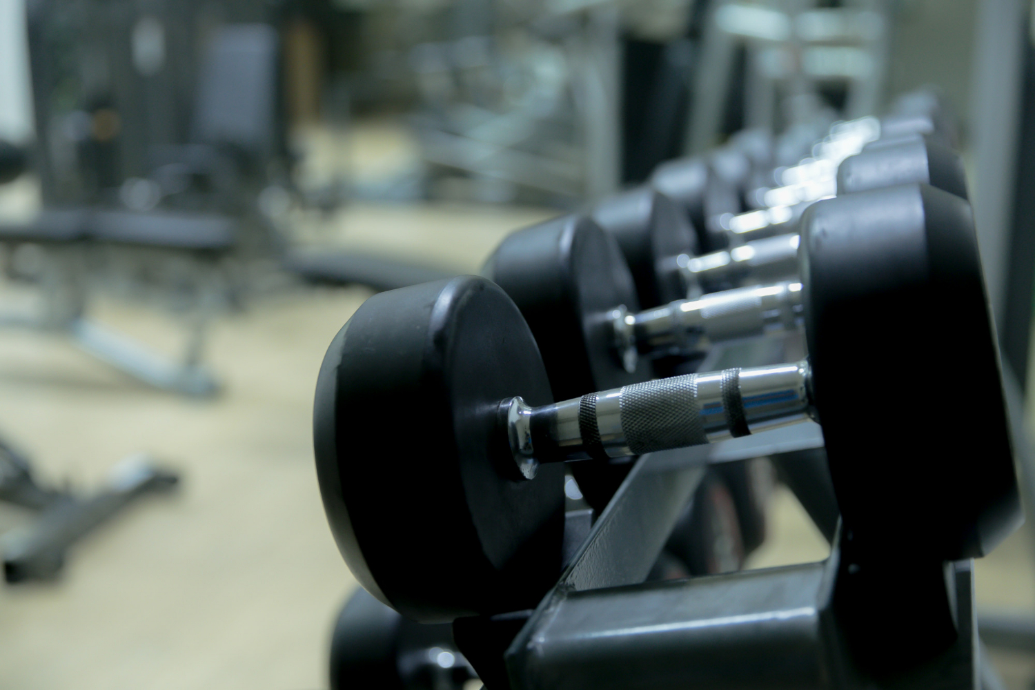 fitness equipment in bodybuilding gym room