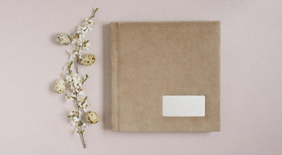 beige girl's diary book with metal frame inscription and spring
