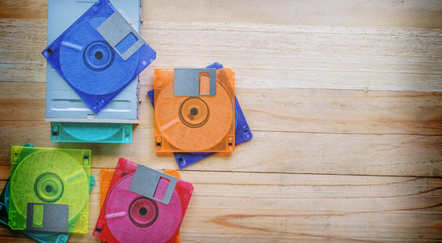 floppy disk drive diskettes wooden table amiga 500