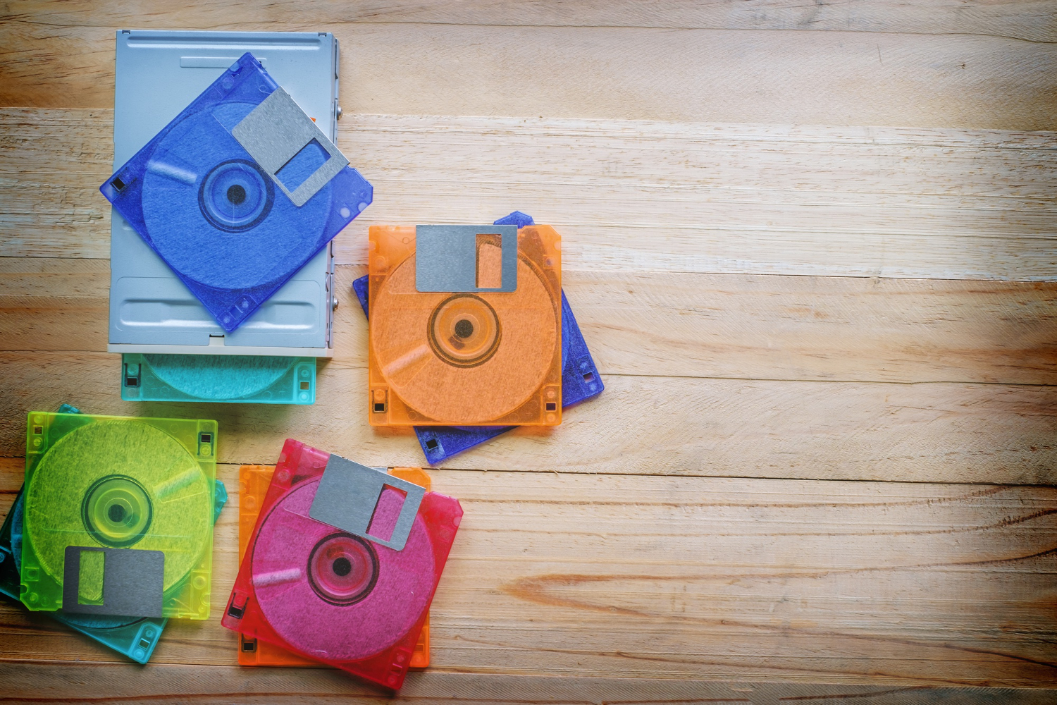 floppy disk drive diskettes wooden table amiga 500