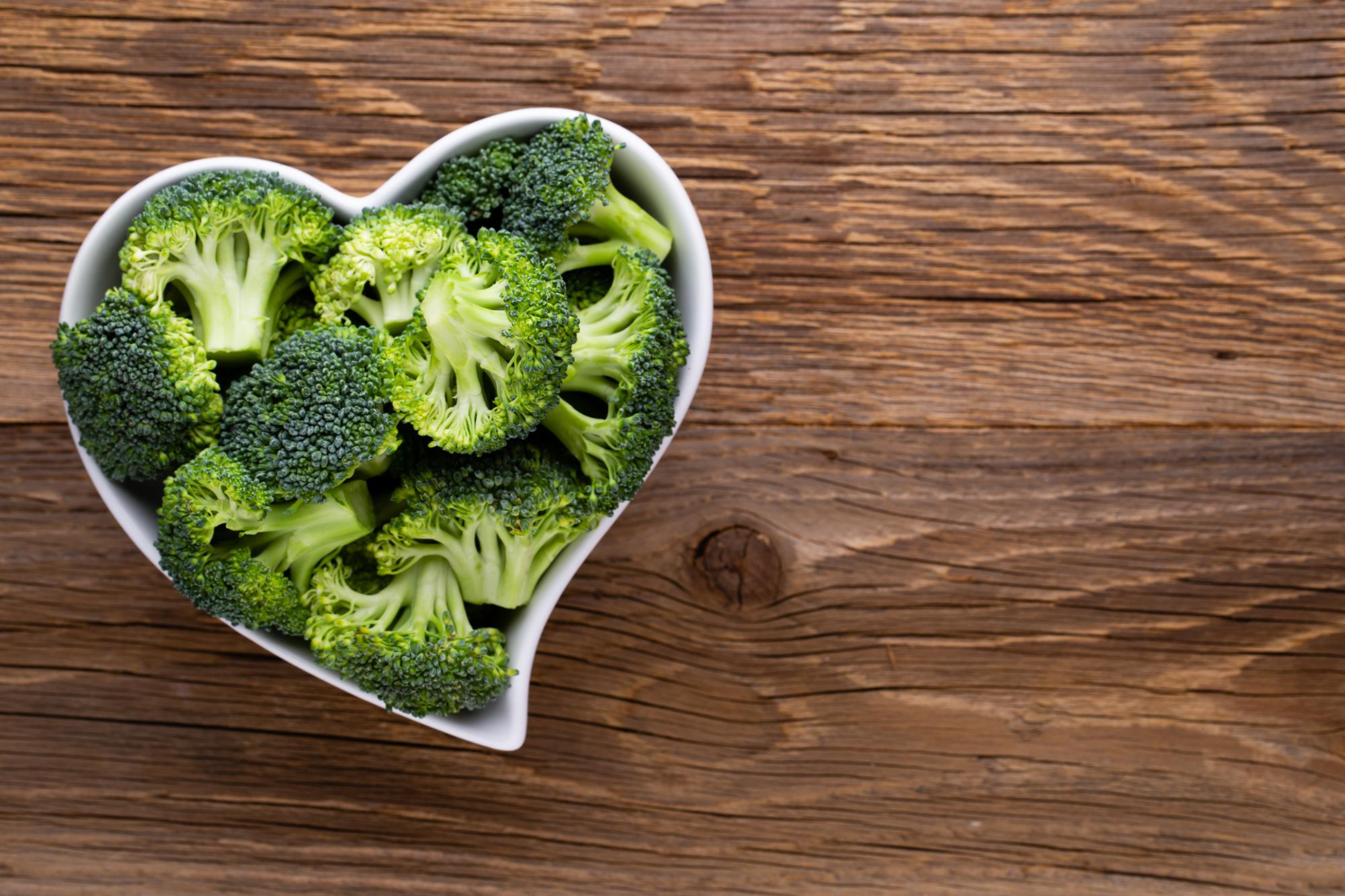 dietary meal plan fresh broccoli heart shaped bowl wooden