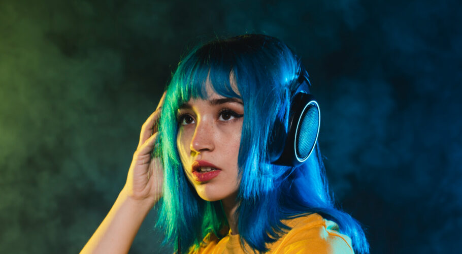 low angle woman in nightclub mixing music