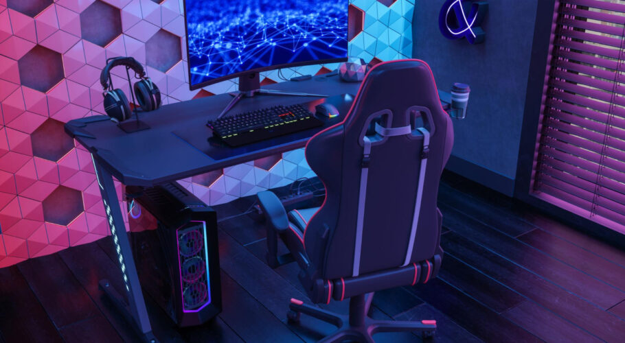 gamer room with gaming chair computer monitor neon lights night