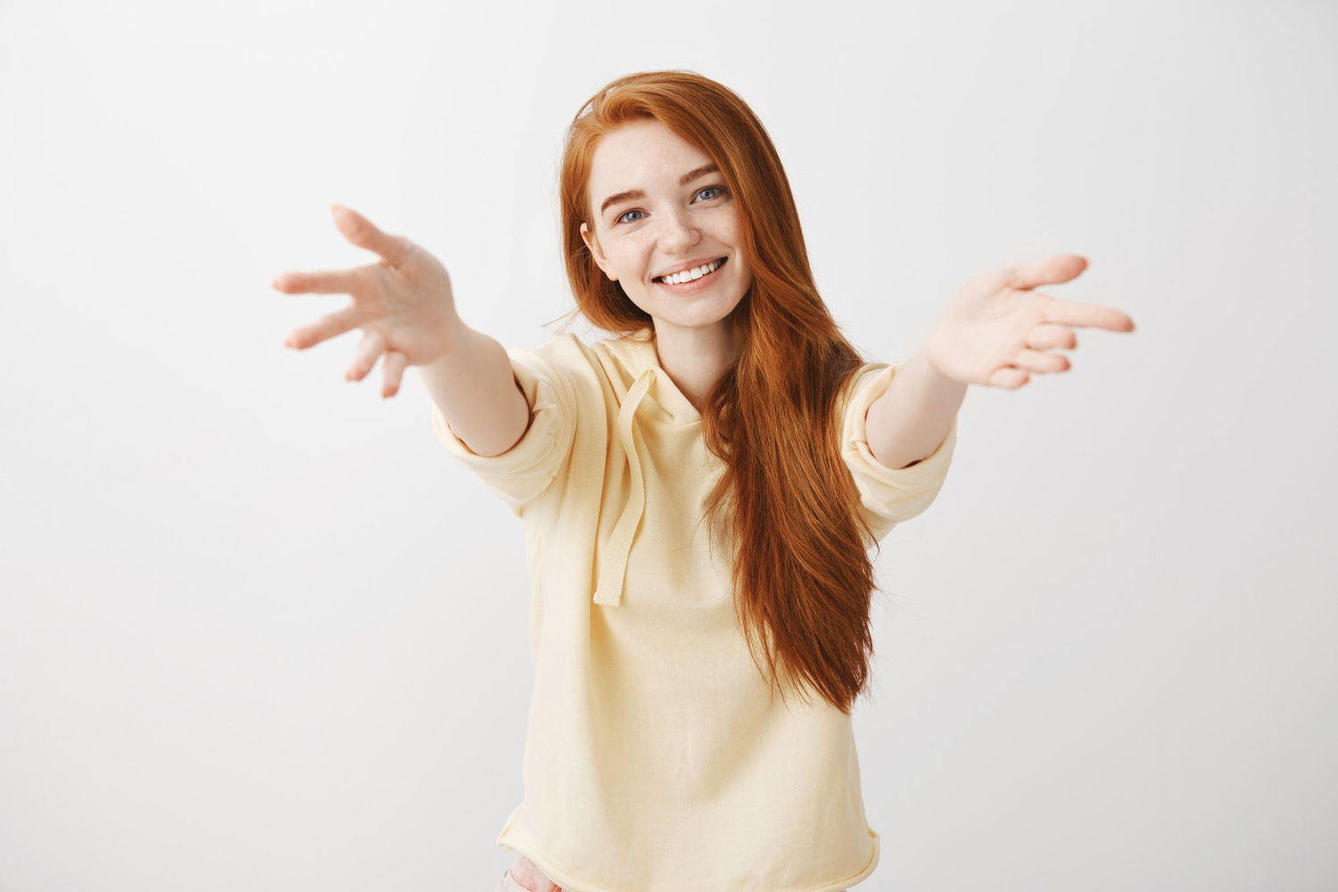 gorgeous smiling redhead kathryn girl reaching hands forward for a hug