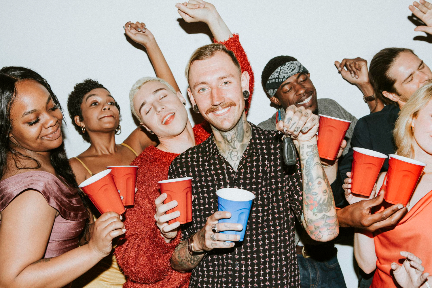 group diverse friends celebrating house party