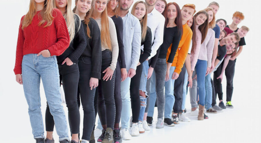 group diverse young people standing queued in line
