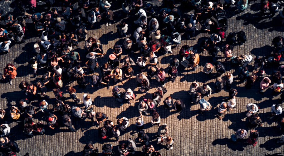 large crowd group in shopping center town square