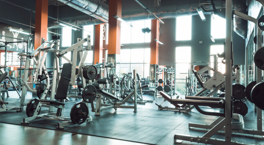 gym interior with equipment bench press