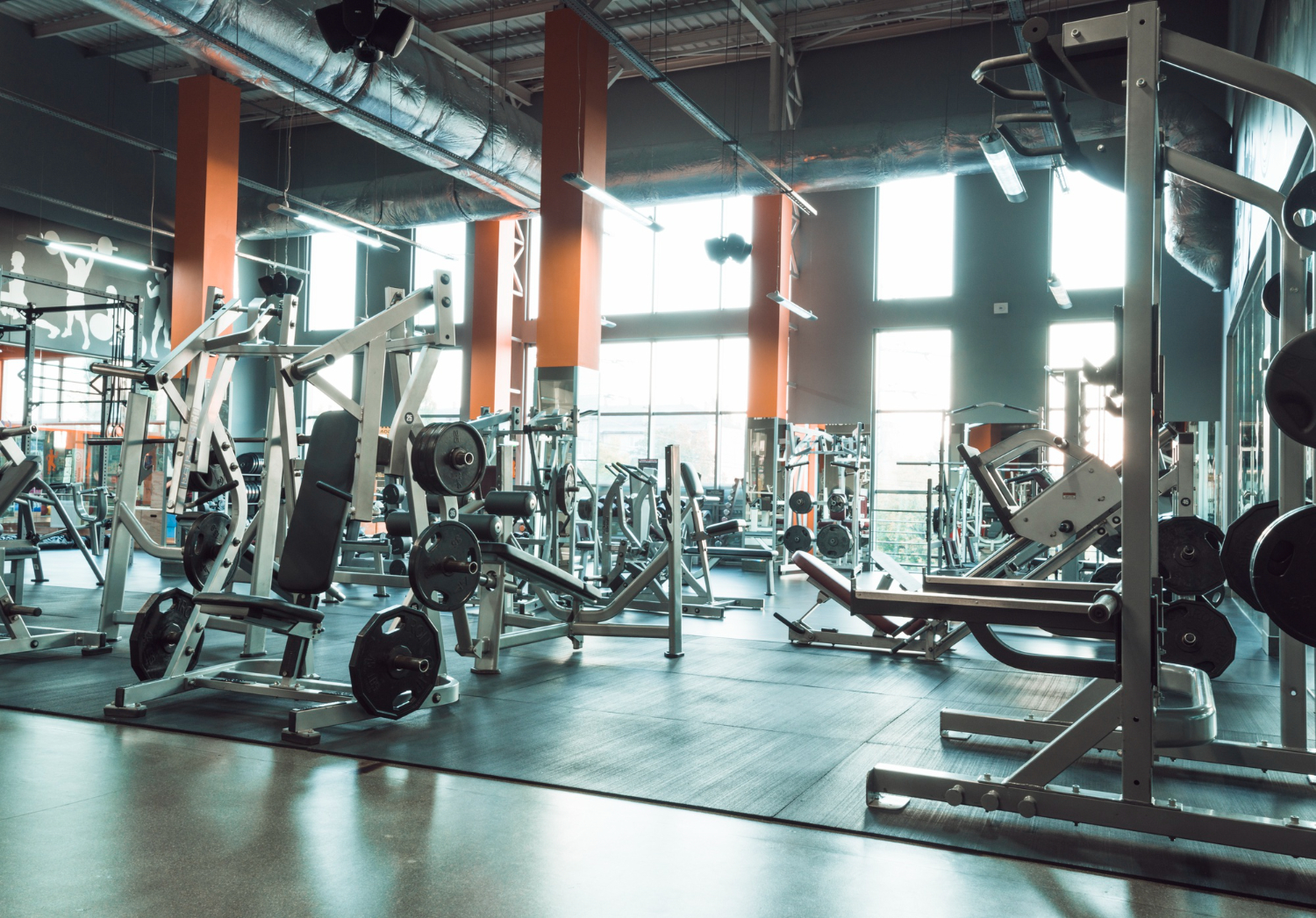 gym interior with equipment bench press