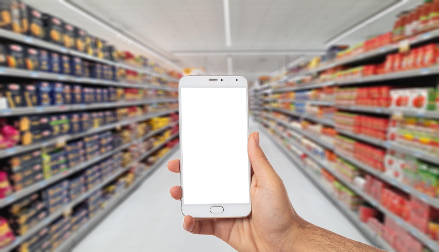 hand holding smartphone with blank screen blur supermarket