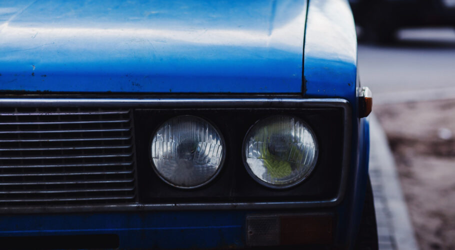 headlights on old retro vintage blue automobile