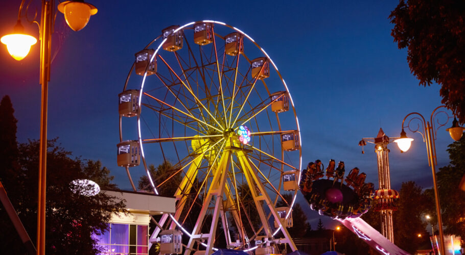 illuminated ferris wheel amusement park at night fishers ghost festival