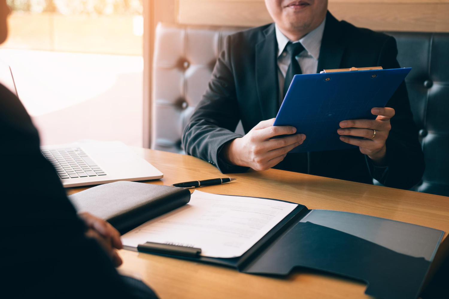 job interviewers are viewing resume data employees who apply jobs office