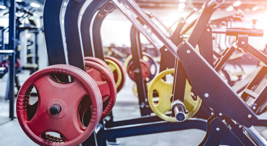 leg trainer equipment weights at gym