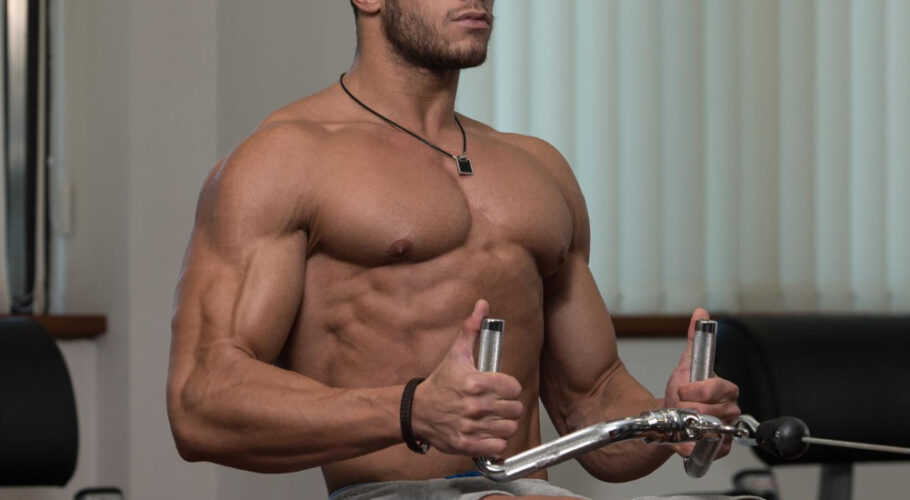 male fitness athlete doing heavy weight exercise back