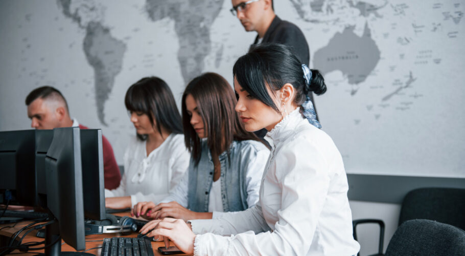 training course for WordPerfect 5.1 group of students learning on computers in classroom