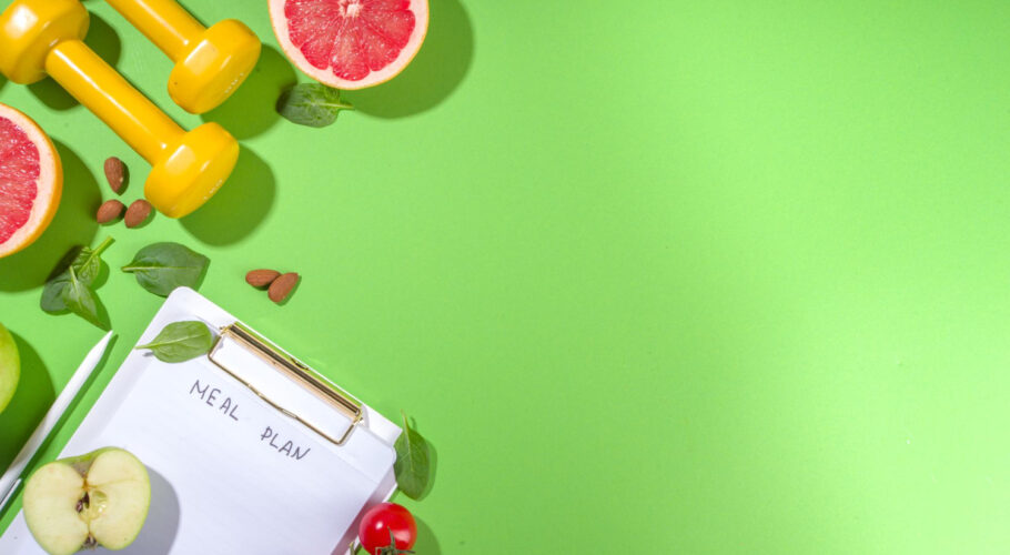 meal diet plan concept with notepad and healthy fruits and vegetables food