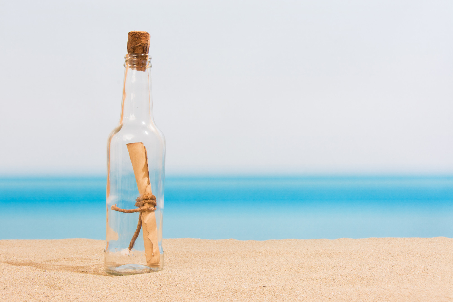 message in a bottle on the sand