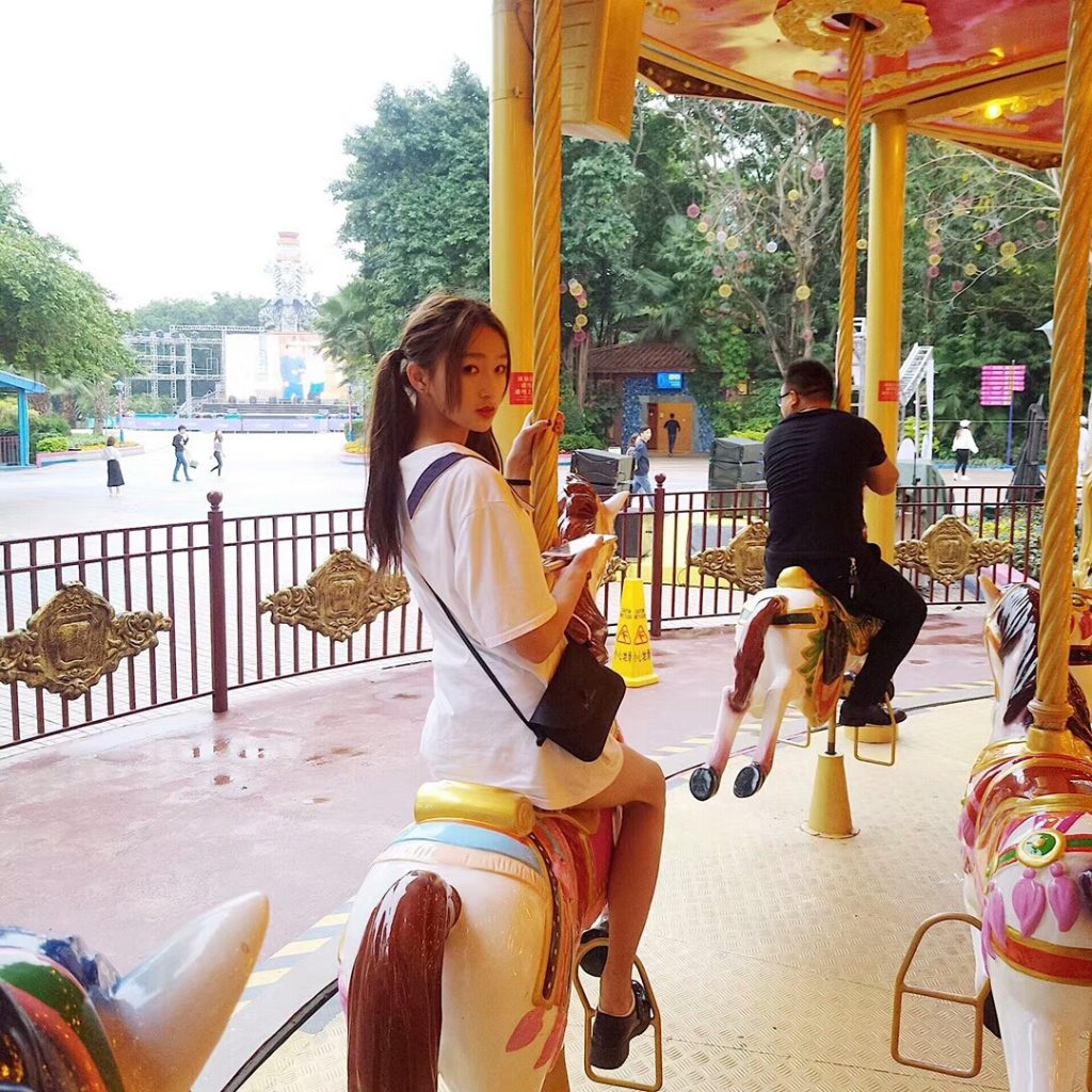 Chinese Girl On Carousel