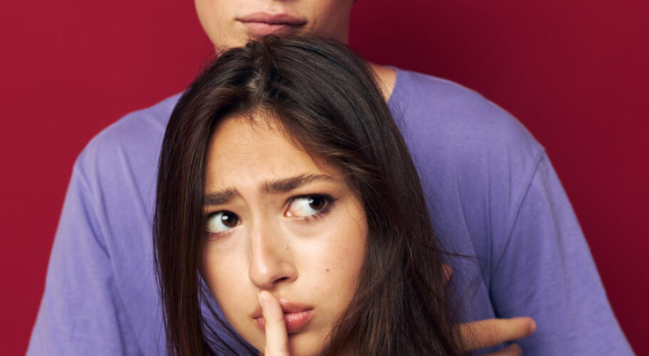 nice guy and girl youthful shushing after breakup