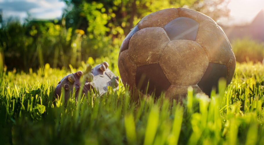 old soccer ball play football sport in backyard