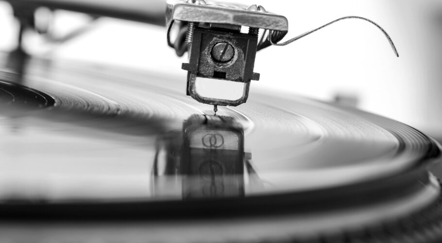 old dusty vinyl turntable player isolated white background